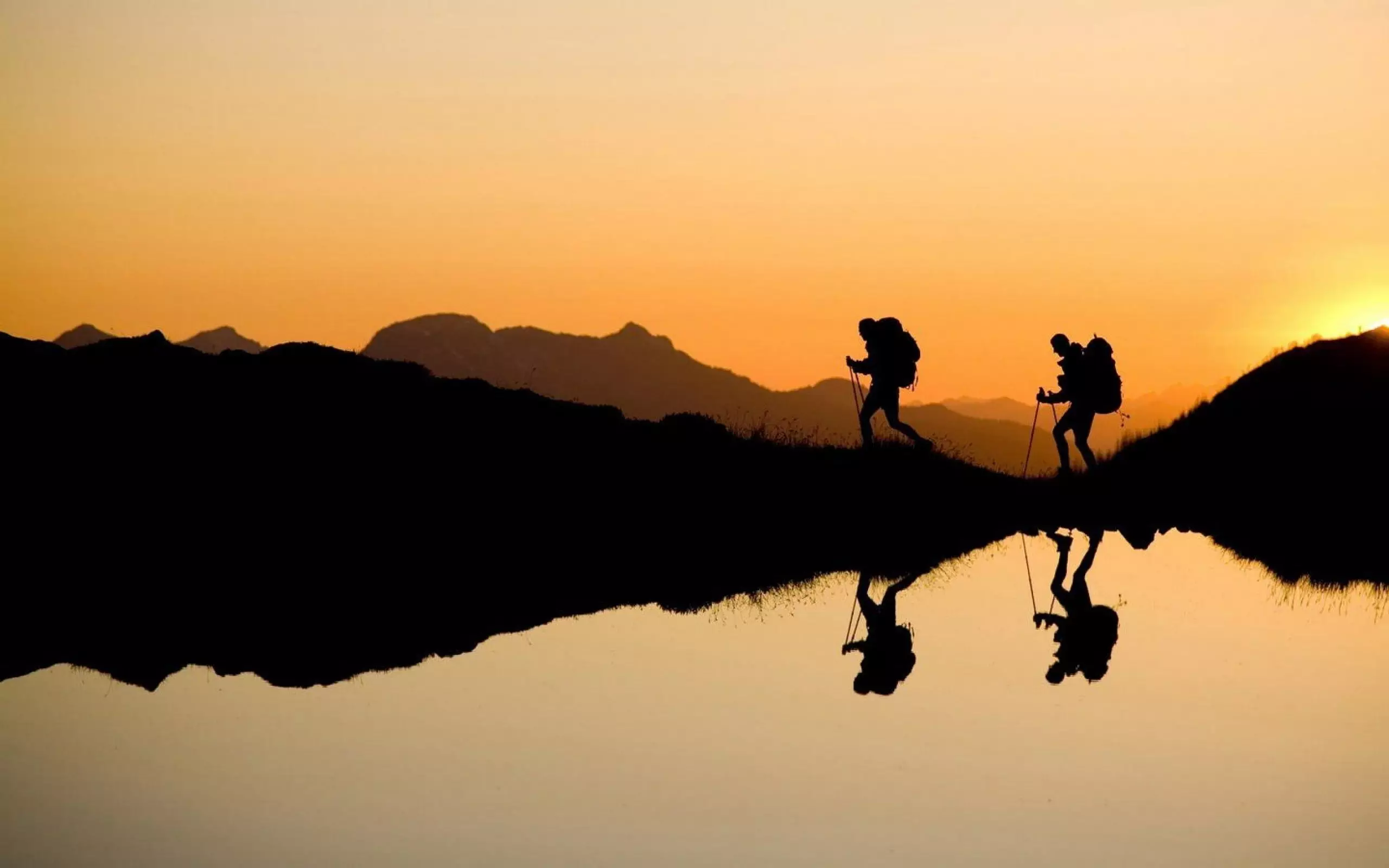 Hikers in the red sunset